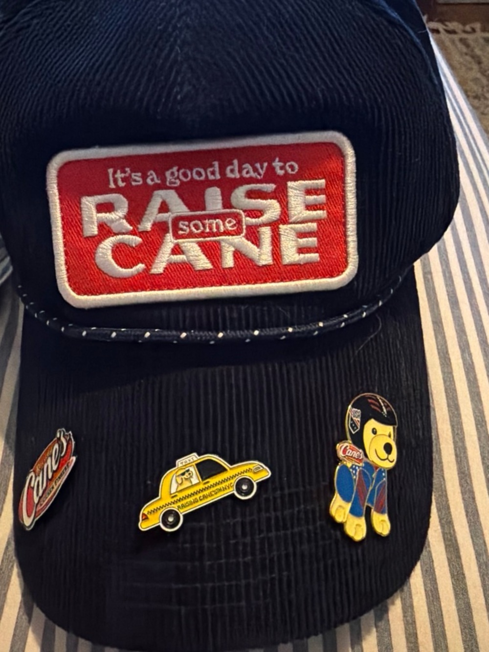 raising canes bat with pins